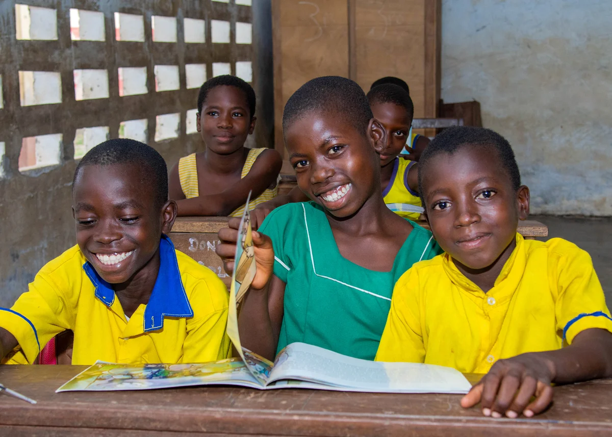 Students reading in a Reading Ghana classroom in Ghana's Western Region