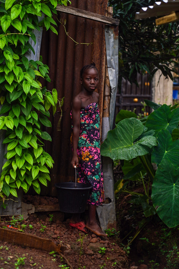 Their home has no running water or electricity, meaning that Sallay does her homework using a flashlight after the sun has set.